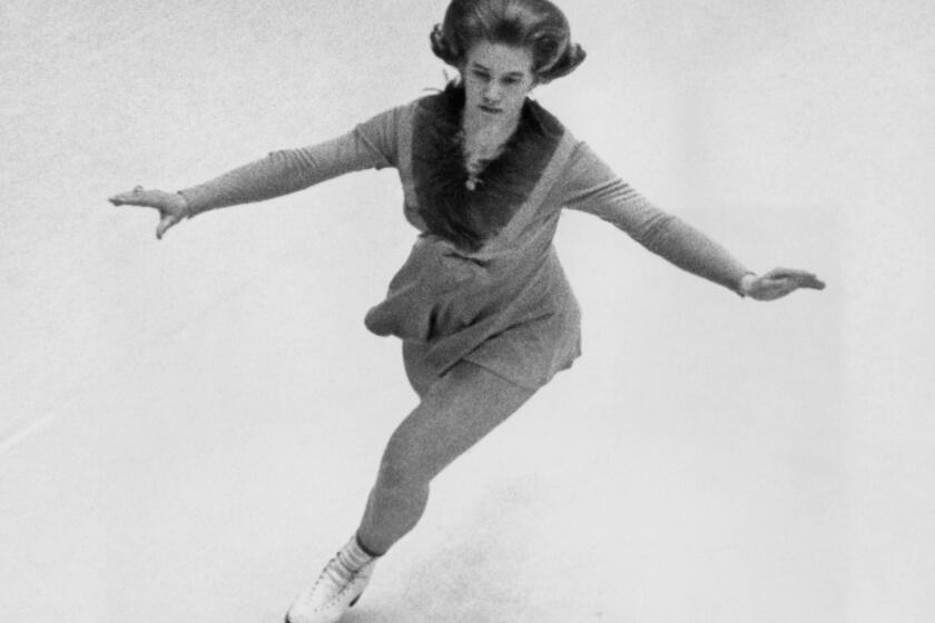 Sjoukje Dijkstra, of The Netherlands, skates her way to a gold medal during the women's figure skating event of the 9th Winter Olympic Games in Innsbruck, Austria, on February 2, 1964. Sjoukje Dijkstra, the figure skater who in 1964 became the first Dutch athlete to win a Winter Olympic gold medal, has died at the age of 82. Katja Kossmayer Dijkstra said in her post that her mother “passed away peacefully at home” on Thursday. The post did not reveal a cause of death. (AP Photo)