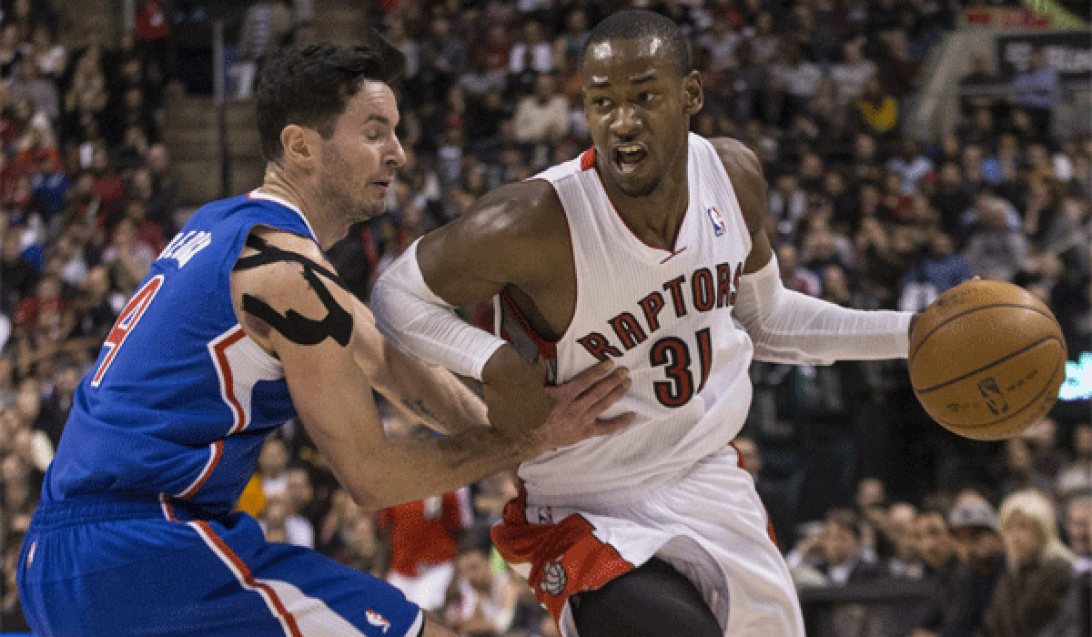 Toronto's Terrence Ross drives past the Clippers' J.J. Redick during the second half Saturday in Toronto.