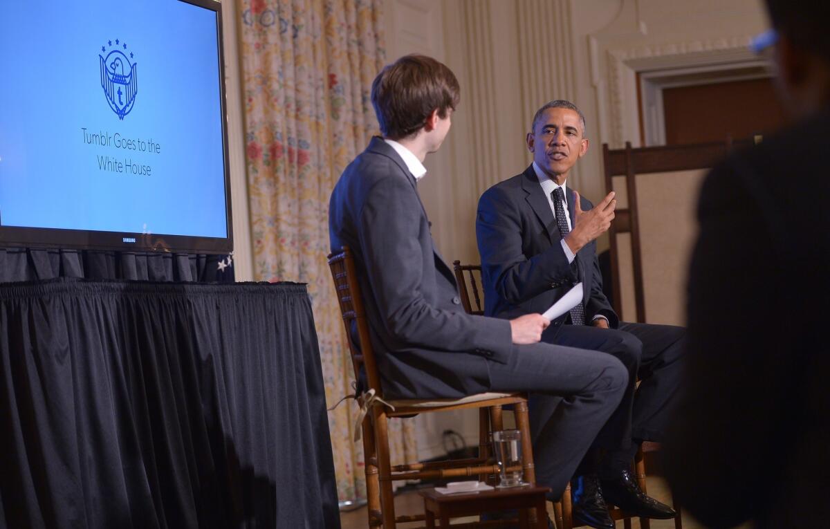 President Obama speaks in the White House during an event on the bloging site Tumblr. At left is Tumblr founder and Chief Executive David Karp.