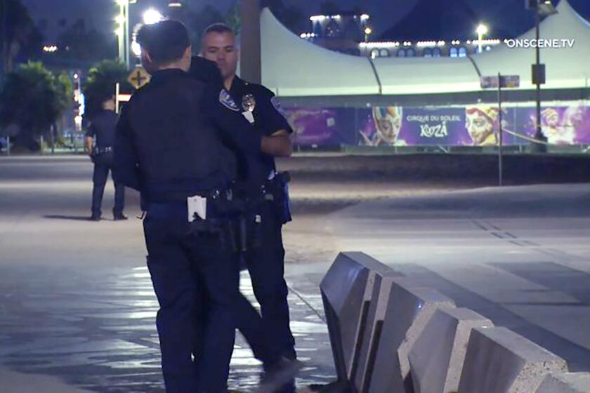 An investigation is underway after a man was arrested for driving onto the sand near the Santa Monica Pier and running over a person, killing them.