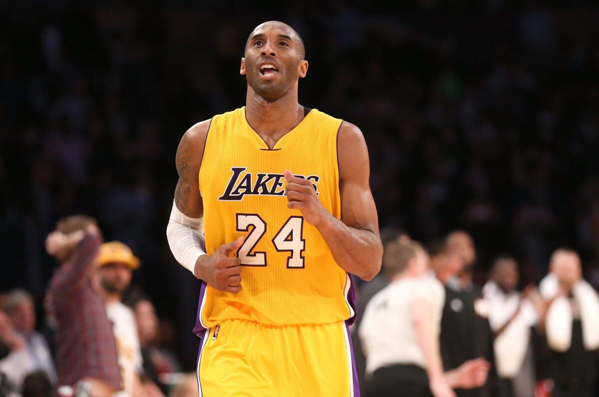 Kobe Bryant of the Los Angeles Lakers after missing his three point attempt to tie the score as time ran out in the game against the Miami Heat at Staples Center on January 13, 2015 in Los Angeles. Off the court, Bryant fared better -- he'll be able to operate his business in Newport Beach until 2032.