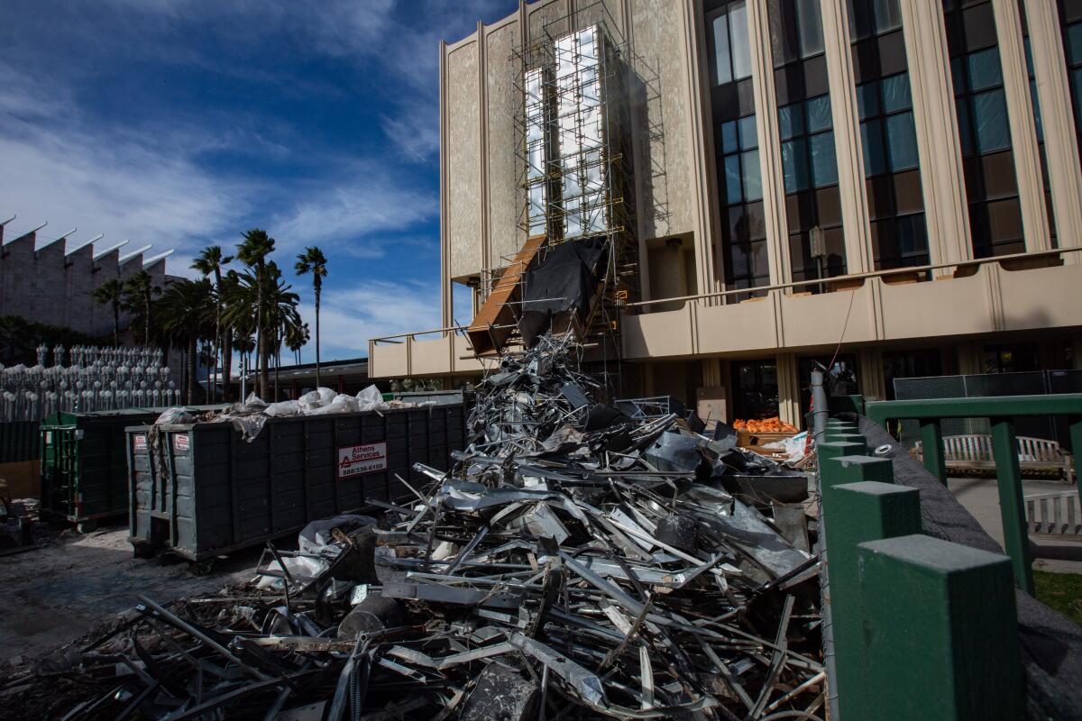 The Los Angeles County Museum of Art has begun asbestos removal prior to demolition of four buildings on its Wilshire Boulevard campus. 