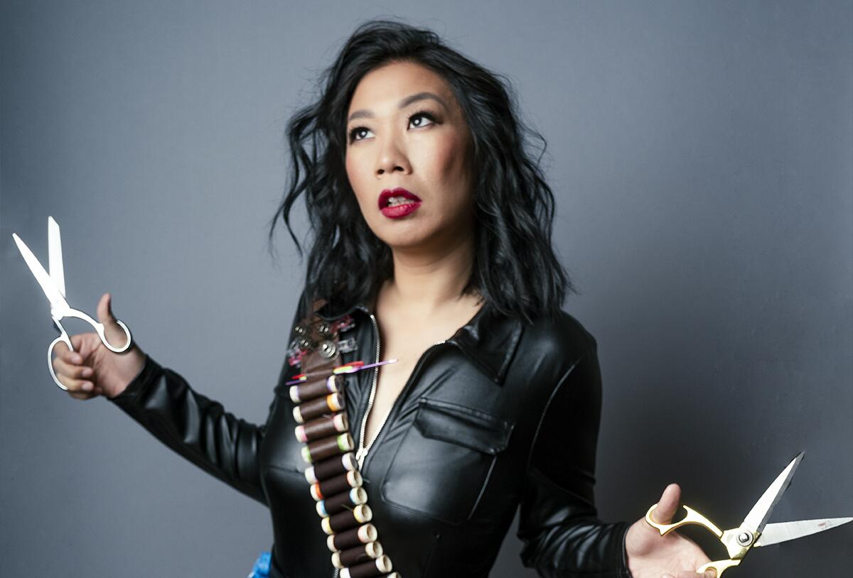Kristina Wong, in her play "Kristina Wong, Sweatshop Overlord."