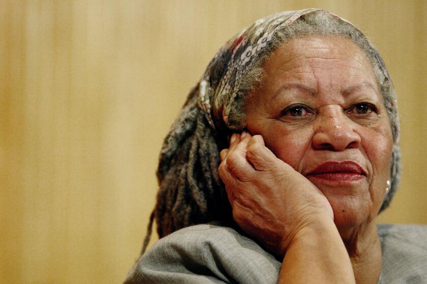 @@*@@* FILE @@*@@* Nobel Prize laureate Toni Morrison listens to Mexico's Carlos Monsivais during the Julio Cortazar professorship conference at Guadalajara University Nov. 25 2005, in Guadalajara City, Mexico. A party for the author drew stars such as former President Bill Clinton and actor Morgan Freeman as well as officials and students from Princeton University where the author has taught for 17 years before announcing her retirement in spring 2006. (AP Photo/Guillermo Arias)