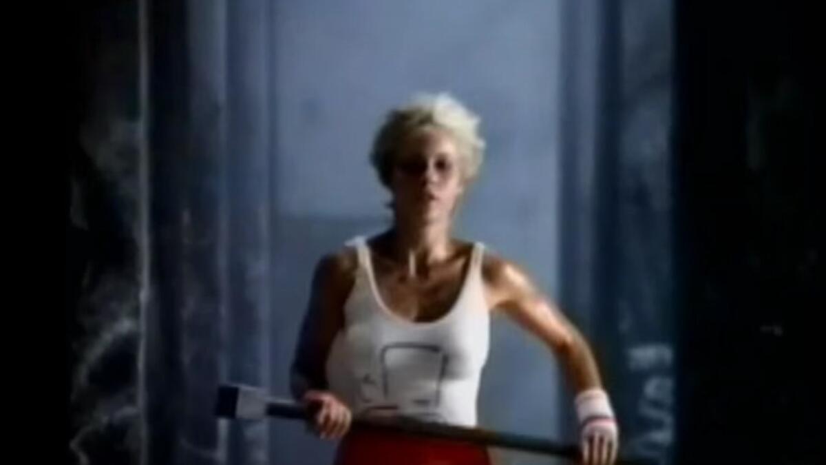 Actress/model Anya Major in her starring role subverting Big Brother in Ridley Scott's "1984" ad for the Apple Macintosh.