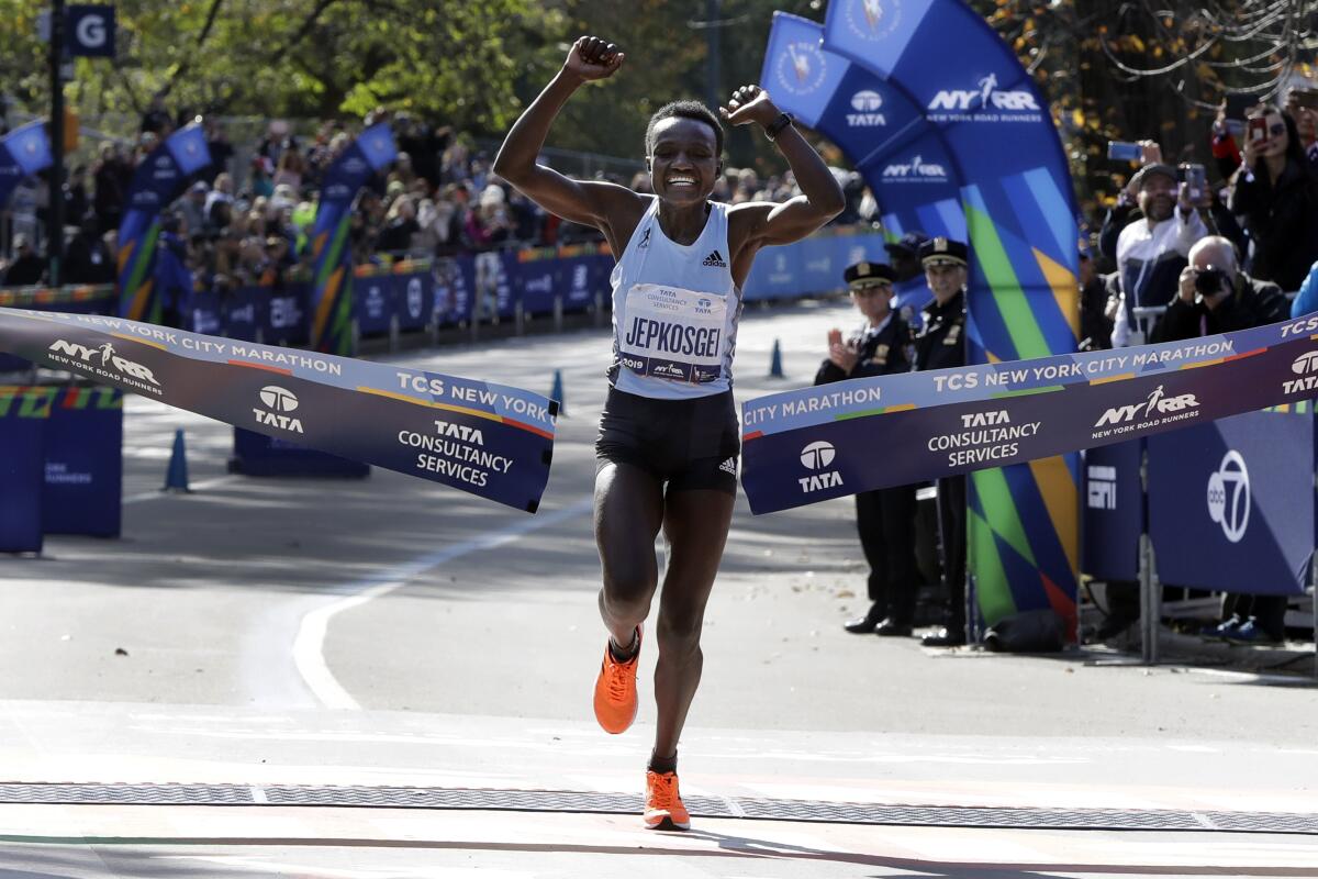 Kenya's Geoffrey Kamworor leads the professional men's division during the New York City Marathon on Nov. 3.