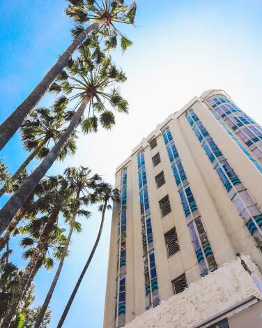Sunset Tower Hotel exterior with palm trees