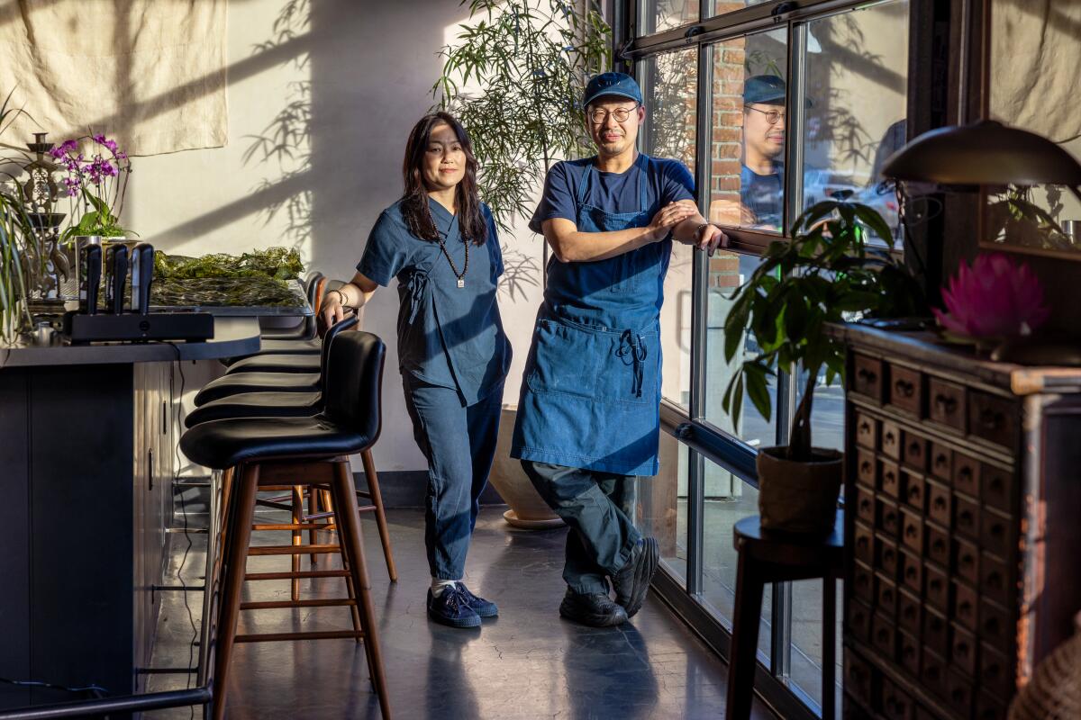 LOS ANGELES, CA - JANUARY 16, 2024: Baroo owners chef Kwang Uh, right, and Mina Park