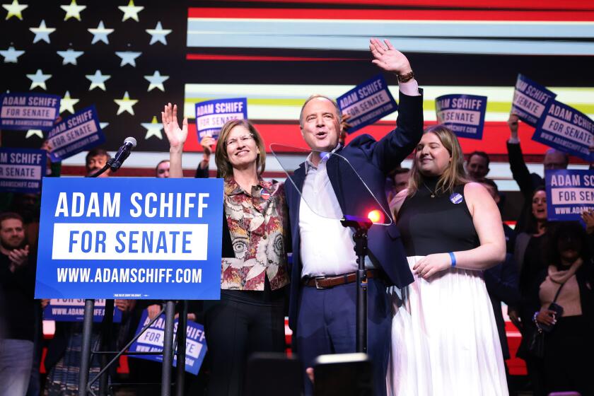 Los Angeles, California March 6, 2024-Adam Schiff celebrates with his wife during an election party at the Avalon in Los Angeles Tuesday night as he seeks to replace Sen. Diane Feinstein in the Senate. (Wally Skalij/Los Angeles Times)