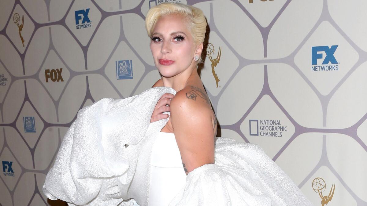 Lady Gaga, who, starting in October, will be on Fox's "American Horror Story: Hotel," changed from black to white on her way from the Emmys to the network's after-party at Vibiana in downtown L.A.
