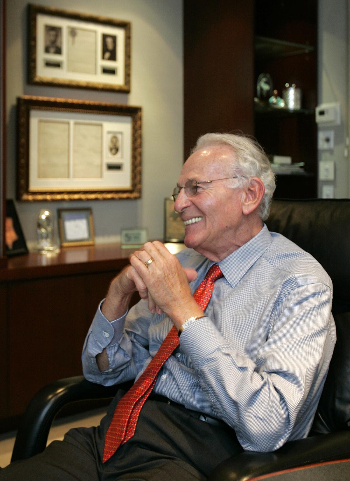Norman Braman talks from his office in Miami.