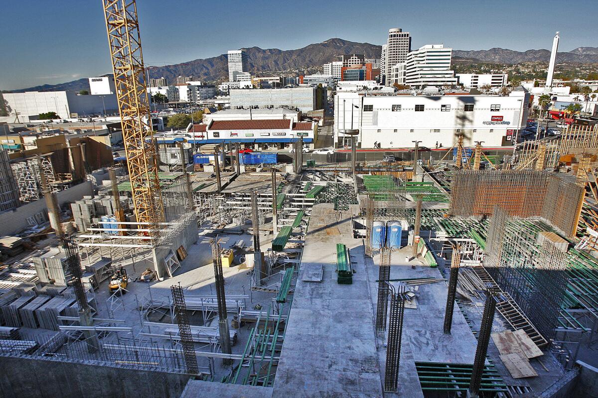 A construction project between Brand Blvd. and Orange Street in downtown Glendale where several properties are under development, many of them for apartments, on Wednesday, November 27, 2013.