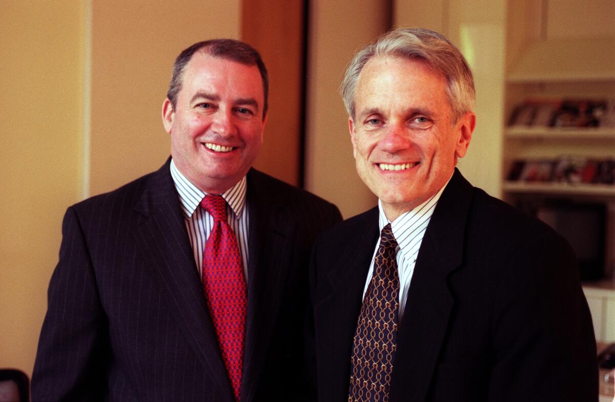 Michael Parks, left, replaced Shelby Coffey III, right, as editor of the Los Angeles Times in 1997. 