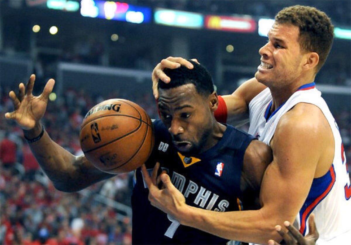 Clippers' Blake Griffin, right, battles Memphis Grizzlies' Tony Allen for a rebound.