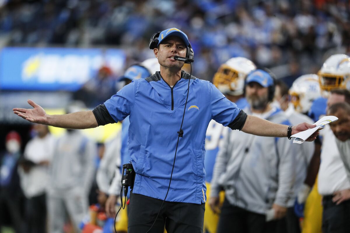 Chargers head coach Brandon Staley shows his frustration to officials during a home game against Denver.