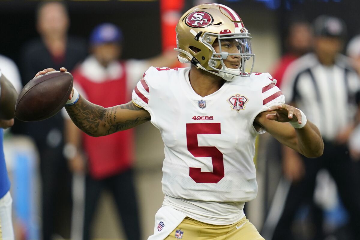 San Francisco 49ers quarterback Trey Lance (5) throws during the first half of a preseason NFL football game against the San Francisco 49ers Sunday, Aug. 22, 2021, in Inglewood, Calif. (AP Photo/Ashley Landis)