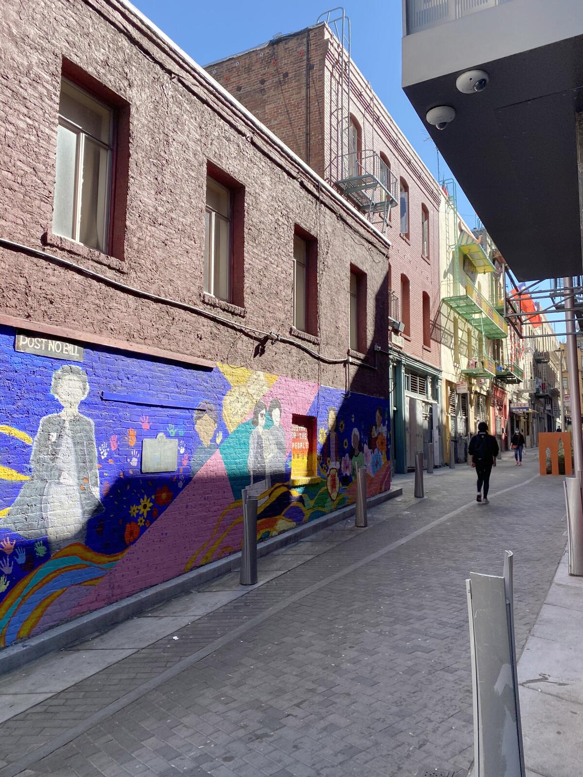 Cynthia Fok captures a once busy alleyway in San Francisco's Chinatown and a mural