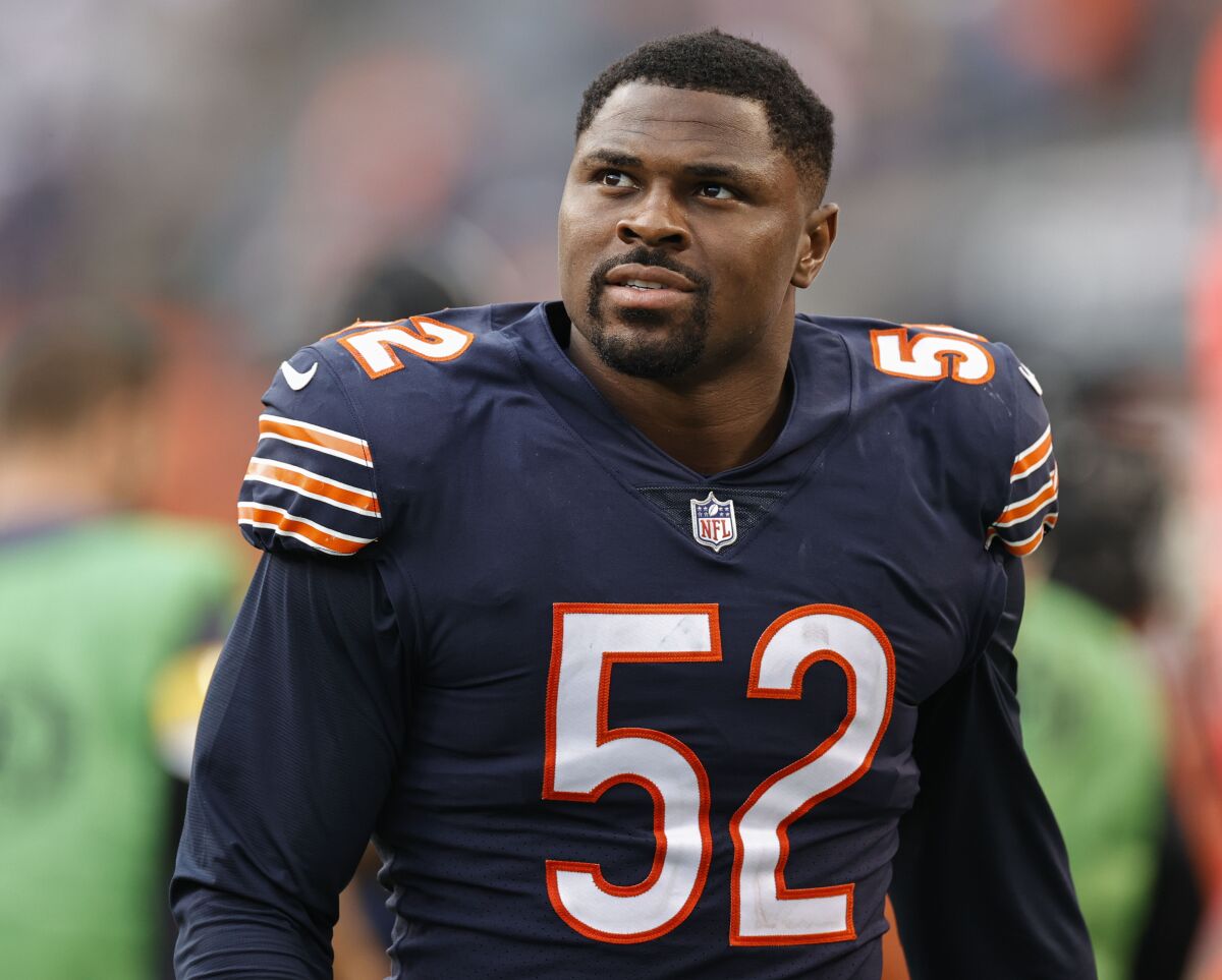 FILE - Chicago Bears' Khalil Mack walks off the field after an NFL football game against the Detroit Lions, Oct. 3, 2021, in Chicago. The Los Angeles Chargers have agreed to acquire Mack from the Bears in exchange for two draft picks, two people familiar with the negotiations confirmed to The Associated Press on Thursday, March 10, 2022. The people spoke on condition of anonymity because the trade cannot become official until the start of the new league year on Wednesday. (AP Photo/Kamil Krzaczynski, File)