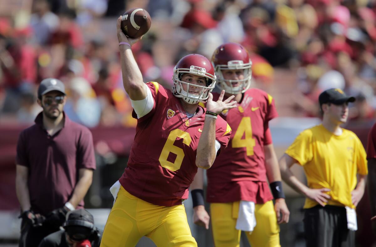 USC quarterback Cody Kessler warms up before the Trojans' spring game at L.A. Coliseum on April 11.