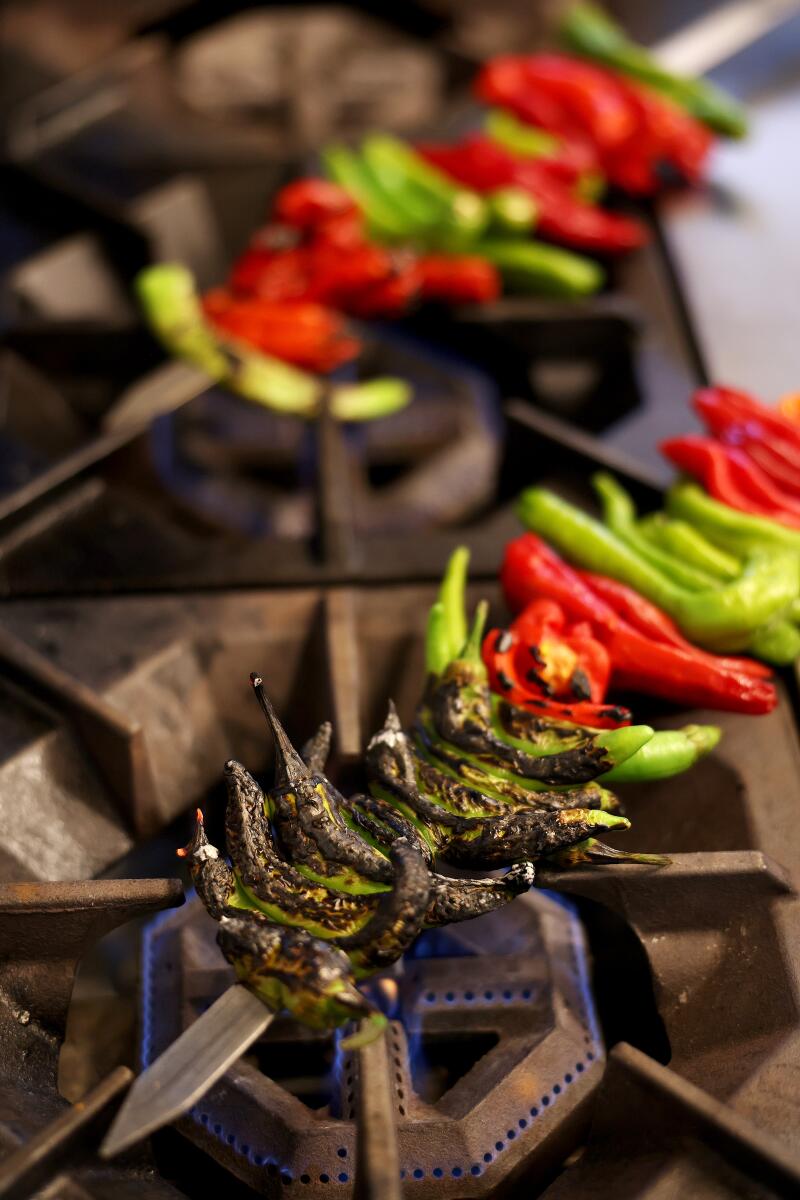 Peppers fire roasted on the stove. 