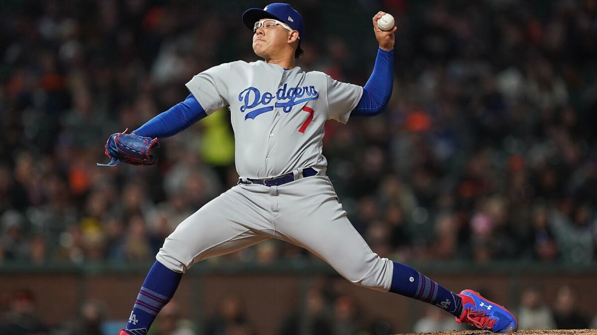 Relief pitcher Julio Urias of the Los Angeles Dodgers pitches against