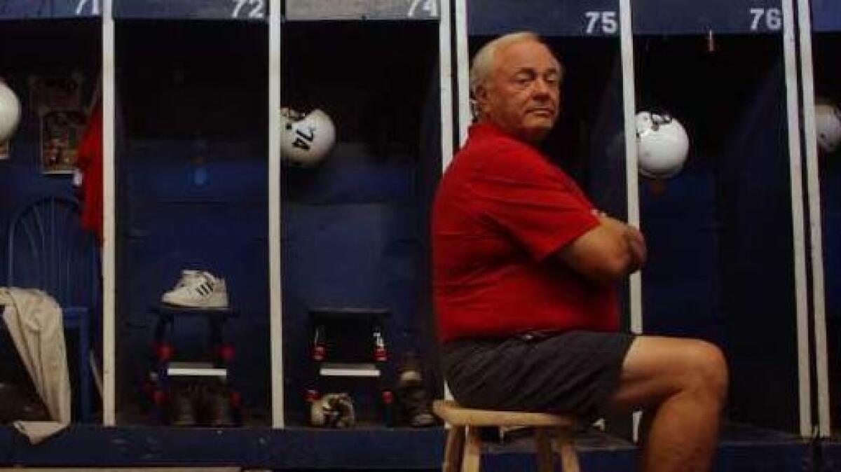 Marijon Ancich in the team's locker room during the 2011 season, his final at St. Paul High.