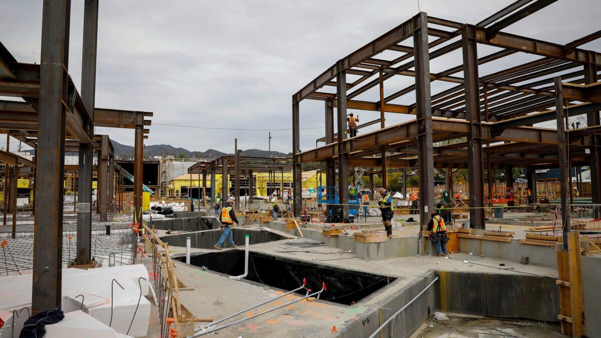 The Palisades Village project under construction at Sunset Boulevard and Swarthmore Avenue.