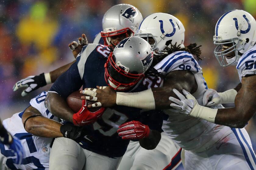New England running back LeGarrette Blount runs with the ball during the second half of the AFC championship game against the Indianapolis Colts on Jan. 18.