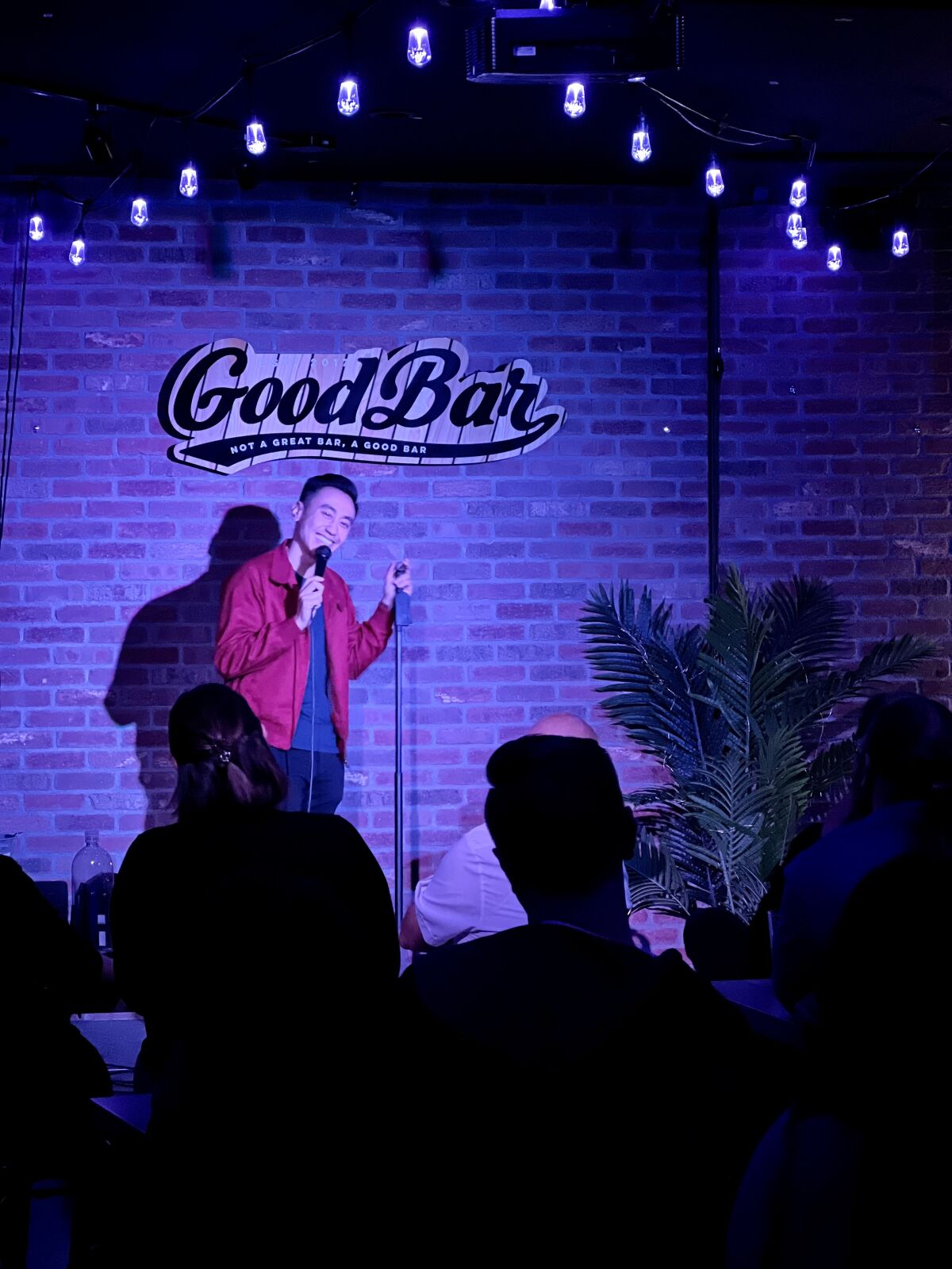 Comedian Steven Ho performs at GoodBar's GoodJokes comedy show.
