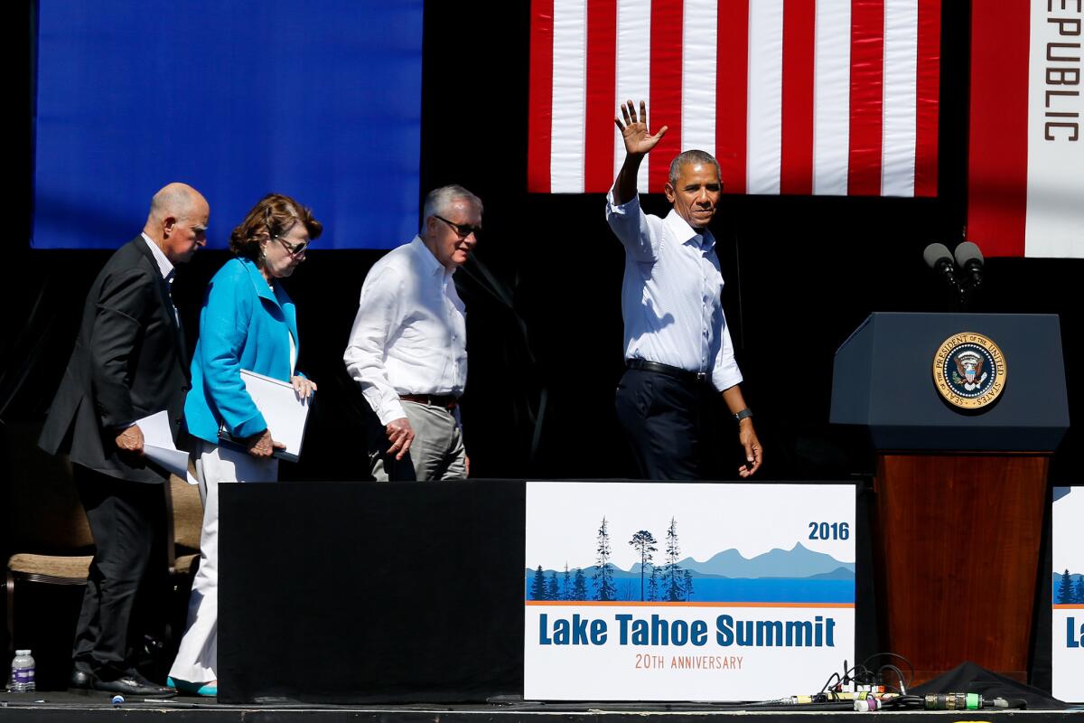 Gov. Jerry Brown, left to right, U.S. Sen. Dianne Feinstein, U.S. Sen. Harry Reid and President Barack Obama leave the stage at the 20th annual Lake Tahoe Summit in Lake Tahoe, Nev.
