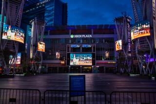 LOS ANGELES, CA --MARCH 21, 2020 -The Xbox Plaza, at the heart of L.A. Live, is empty, in downtown Los Angeles, CA, Saturday night, March 21, 2020. This was the first weekend night under California Gov. Gavin Newsom's "Safer at Home" mandate, which implored all Californians to stay home in an effort to slow the spread of the coronavirus. (Jay L. Clendenin / Los Angeles Times)