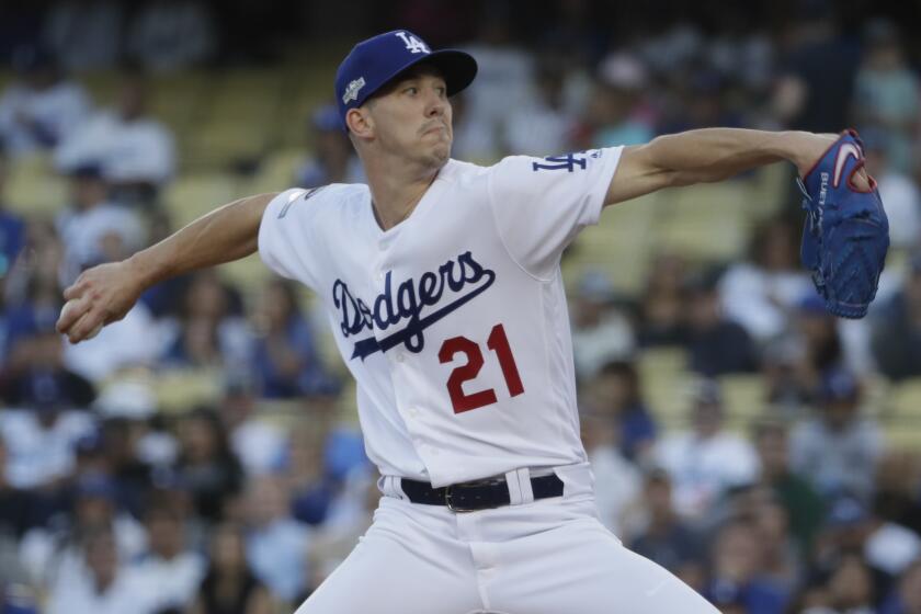 LOS ANGELES, CA, THURSDAY, OCTOBER 3, 2019 - Los Angeles Dodgers starting pitcher Walker Buehler (21) in the first inning of game one of the National League Division Series against the Nationals at Dodger Stadium. (Robert Gauthier/Los Angeles Times)