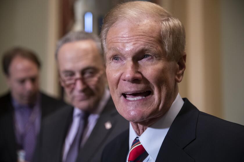 FILE - In this Nov. 13, 2018 file photo, Sen. Bill Nelson, D-Fla., attends a news conference at the Capitol in Washington. President Joe Biden has chosen Nelson, a former senator from Florida who flew on the space shuttle to lead NASA. Biden announced his intent Friday, March 19, 2021.(AP Photo/J. Scott Applewhite, File)