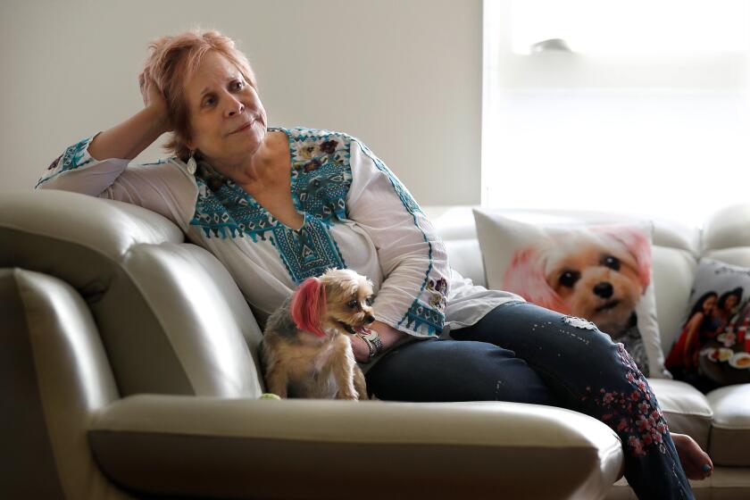 Audrey Tieger, a retired educator, is with her dog ChaCha at home in Los Angeles on Tuesday, August 20, 2019.