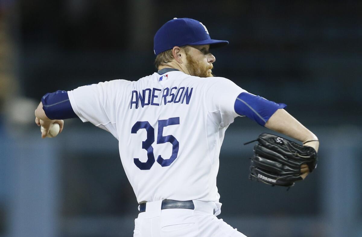 The Dodgers' Brett Anderson pitches against Colorado on Tuesday night.