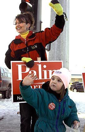 Sarah Palin, with daughter Piper, campaigns for governor of Alaska in November 2006.
