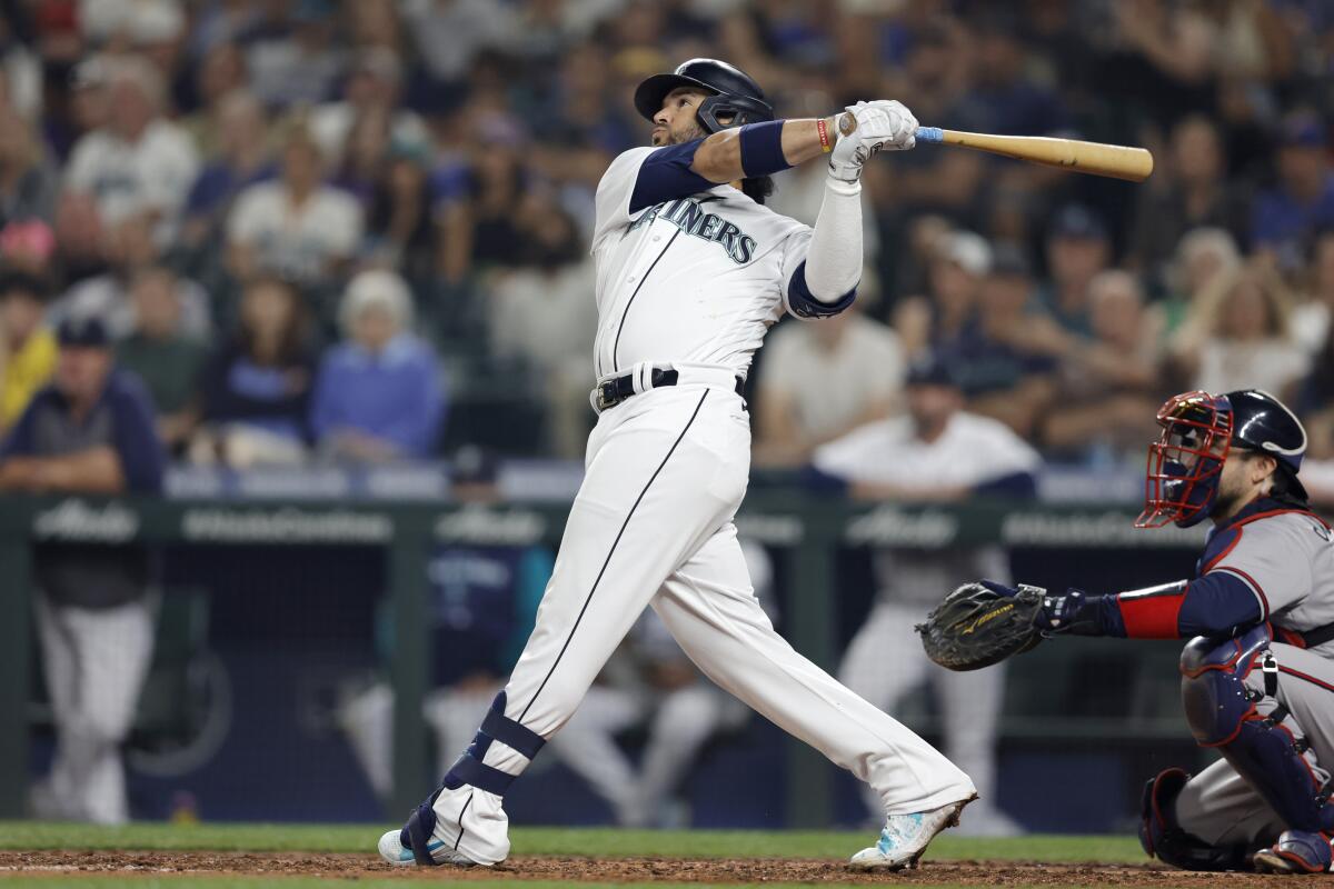Mariners use 2 homers, Kirby's pitching to stop Braves