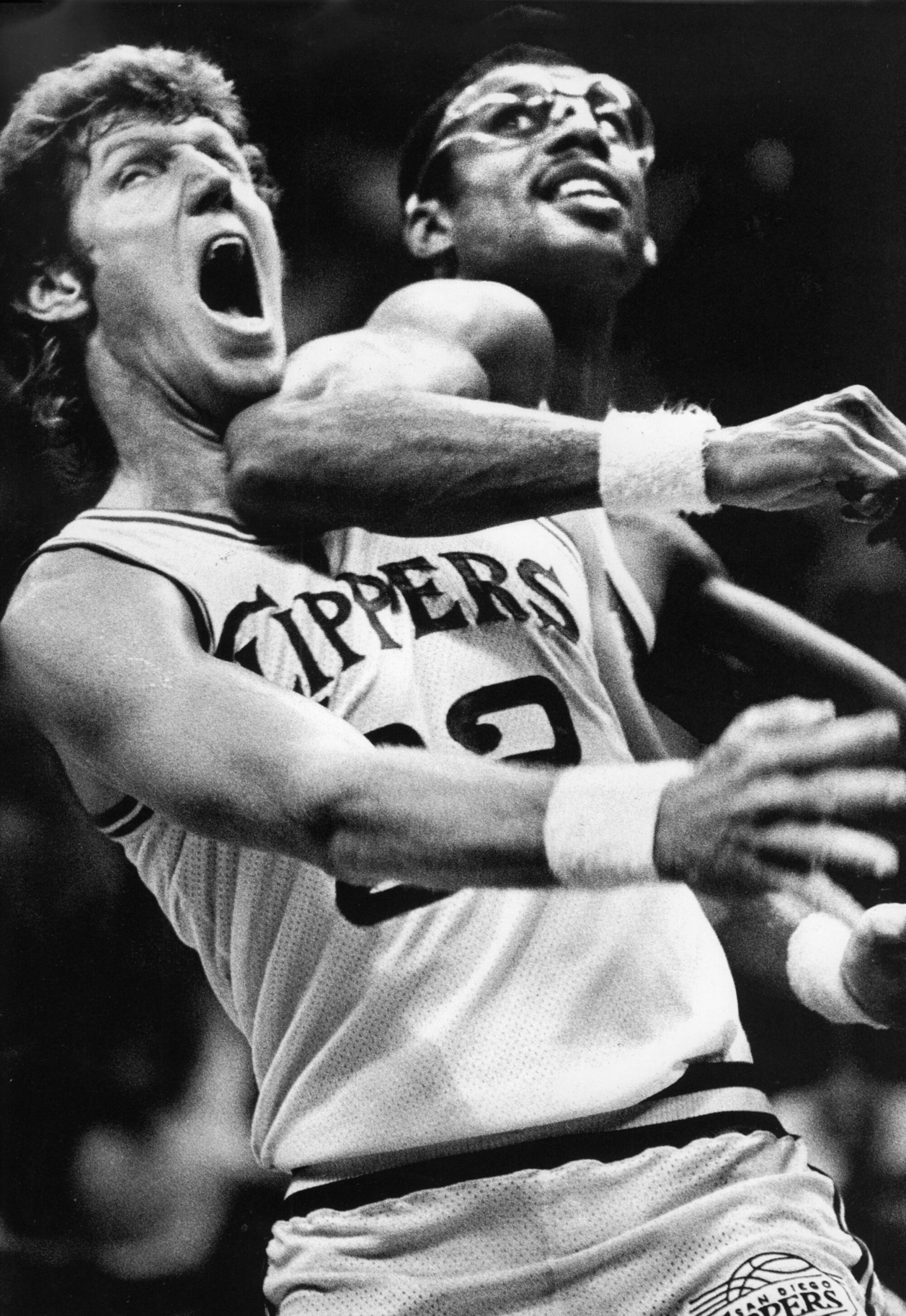 Bill Walton and Kareem Abdul-Jabbar mix it up under the basket in a 1983 NBA game