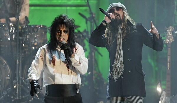 Alice Cooper, left, and Rob Zombie perform at the Rock and Roll Hall of Fame induction ceremony, held at New York's Waldorf Astoria Hotel. Zombie was also the one to officially induct the band Alice Cooper into the Rock Hall.