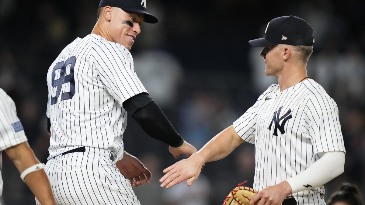 Cole gets 5th win, Yankees hit 3 HRs in 4-2 win at Texas - The San Diego  Union-Tribune