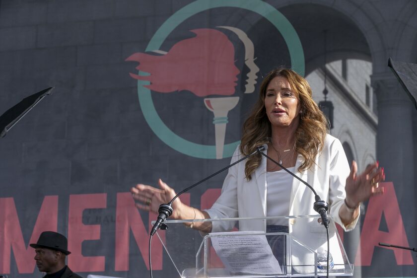 FILE - In this Jan. 18, 2020, file photo, Caitlyn Jenner speaks at the fourth Women's March in Los Angeles. Jenner, the former Olympic champion and reality TV personality now running for California governor, said she opposes transgender girls competing in girls' sports at school. Jenner told a TMZ reporter on Saturday, May 1, 2021, that it's "a question of fairness." (AP Photo/Damian Dovarganes, File)