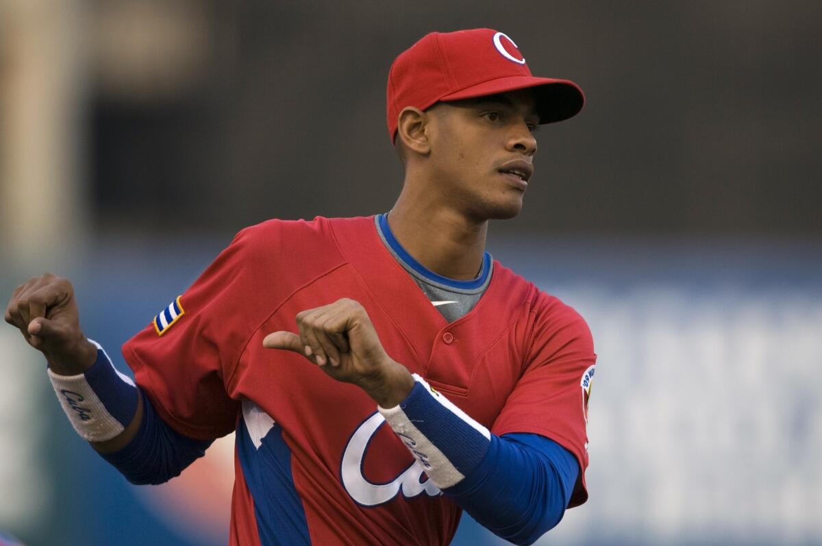 Cuba's Hector Olivera attends training before a World Baseball Classic game in 2009.