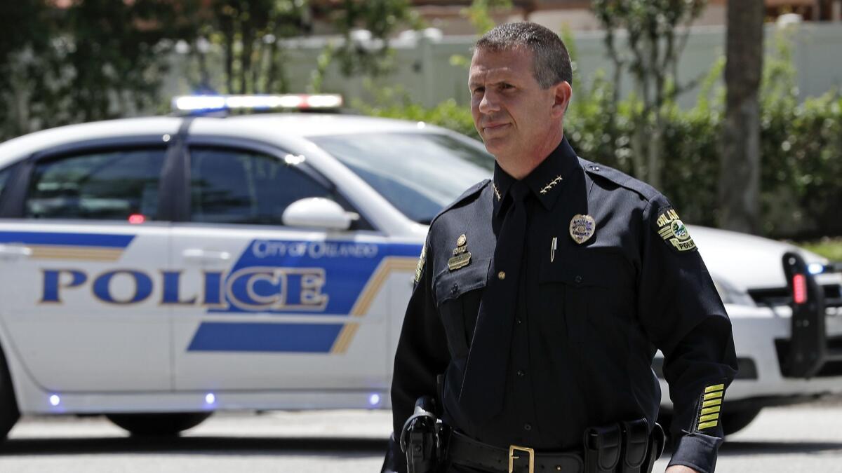 Orlando Police Chief John Mina arrives at a news conference during a hostage standoff June 11.