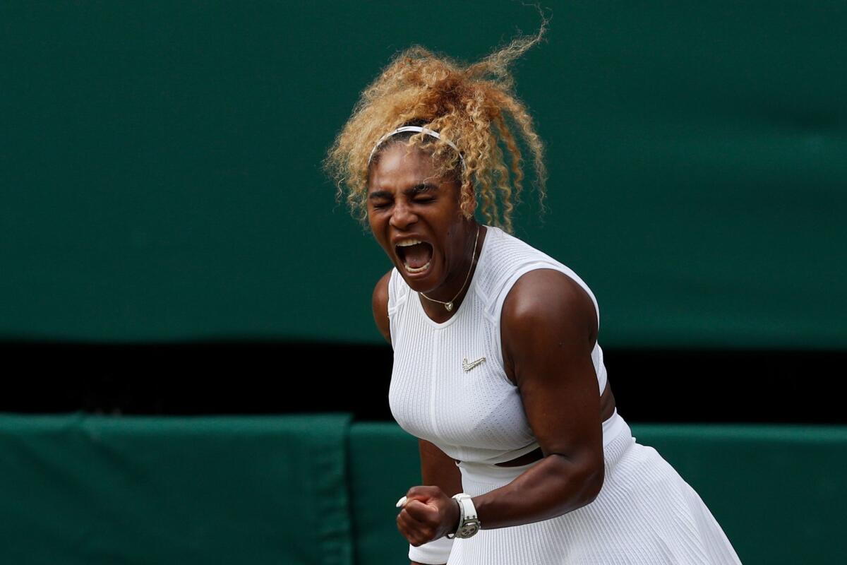 Serena Williams celebrates after winning a point against fellow U.S. player Alison Riske during their Wimbledon quarterfinal match Tuesday.