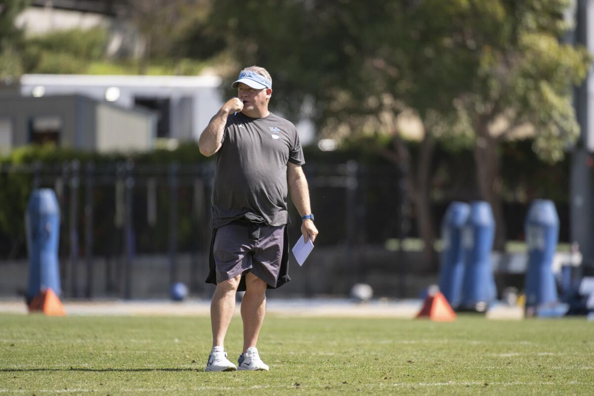 UCLA coach Chip Kelly watches his players during the team's spring showcase April 23, 2022.