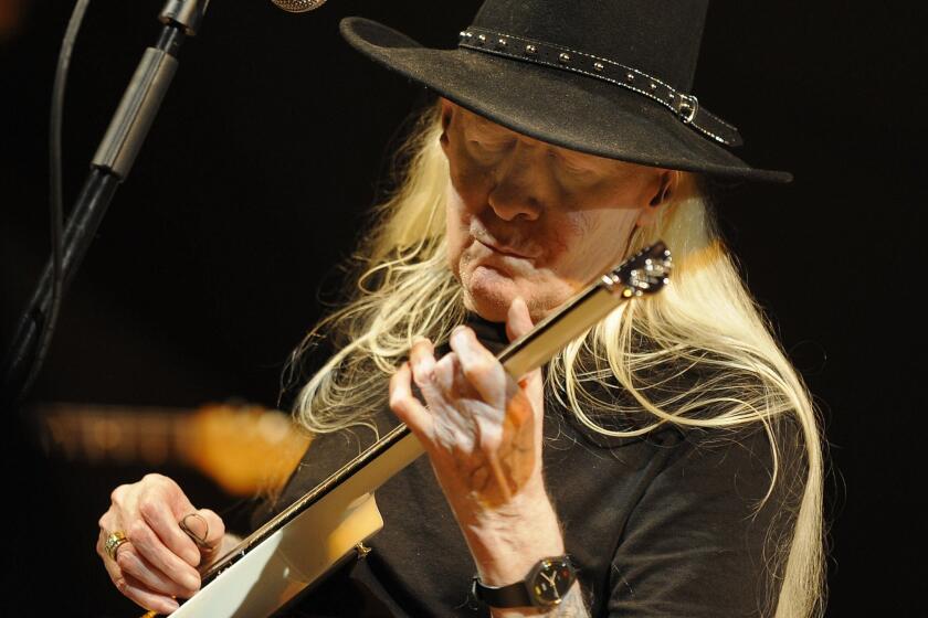 Texas guitarist Johnny Winter performs in 2008. Winter died Wednesday at 70 while on tour in a hotel in Zurich, Switzerland.