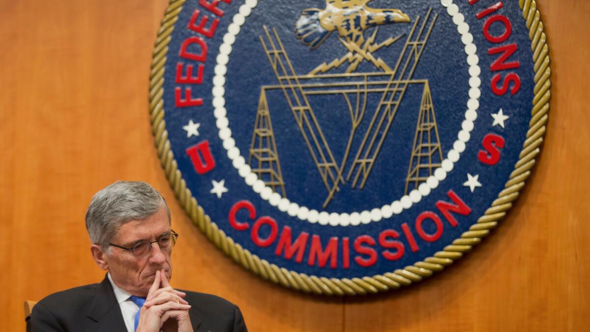 Federal Communications Commission (FCC) Chairman Tom Wheeler listens to commissioners speak prior to a vote on Net Neutrality in February 2015.