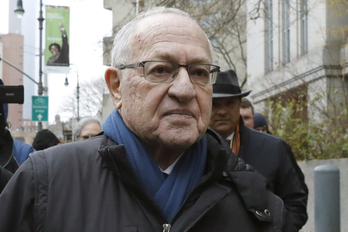 Alan Dershowitz, one of President Trump's impeachment lawyers, leaves a federal courthouse in New York on Dec. 2.