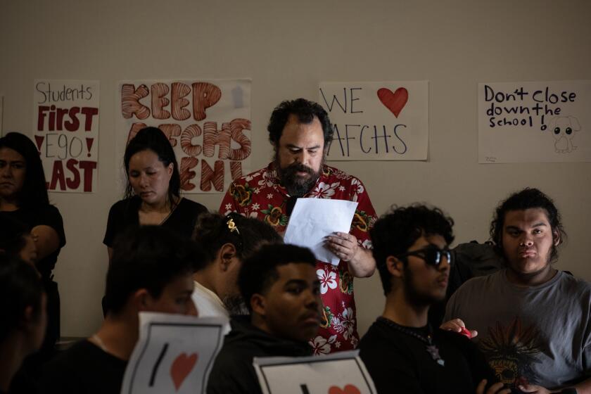San Diego, California - April 29: Brenan Lim, a math teacher, speaks during a special board meeting that will determine whether to close America's Finest Charter High School on Monday, April 29, 2024 in San Diego, California.(Ana Ramirez / The San Diego Union-Tribune)