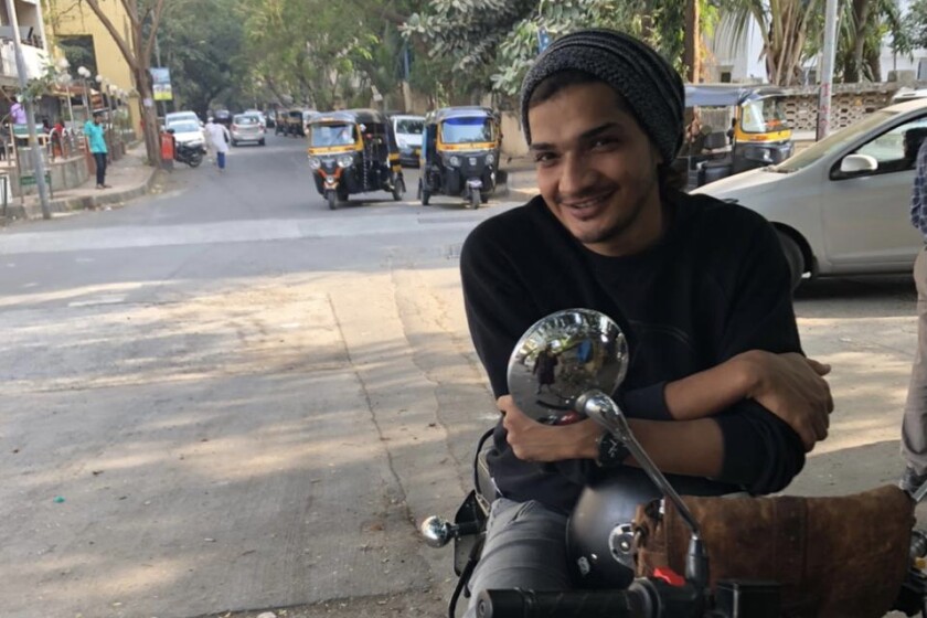 Comedian Munawar Faruqui is seen on a motorcycle